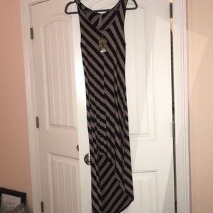 Cute high low dress new with tags. tight fitted